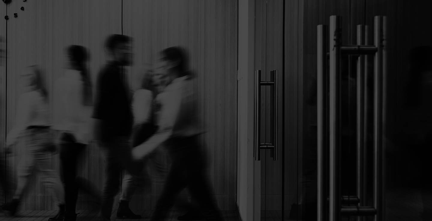 Reflections in window of people moving fast